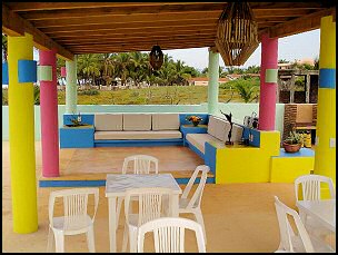 Poolside lounge area with grill