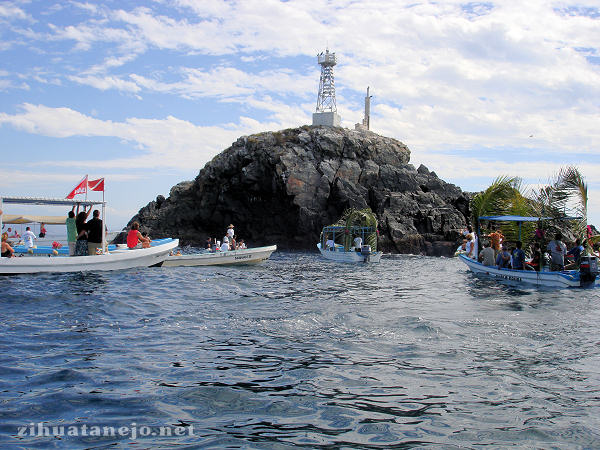 Flotilla of pangas at La Piedra Solitaria Flotilla of pangas at La Piedra Solitaria